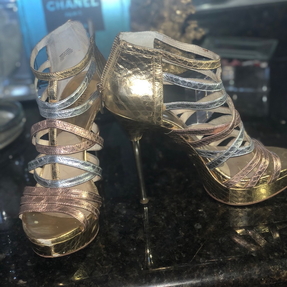 Multi color gold stilletos.